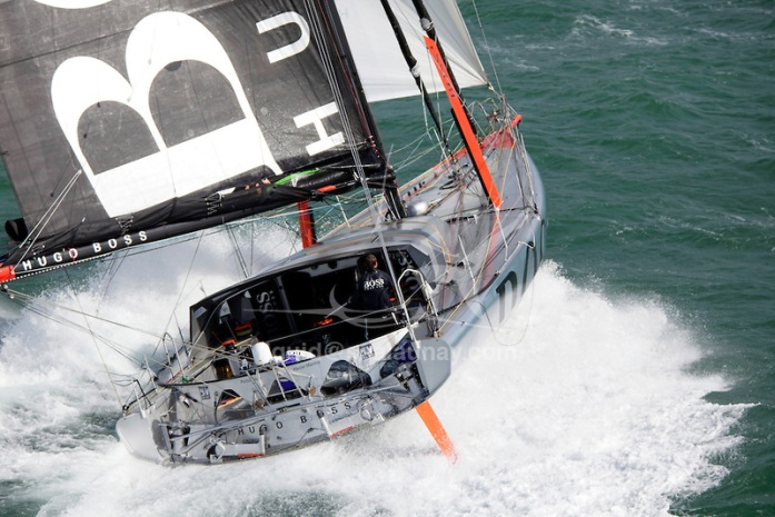 Aerial photo-shoot of the IMOCA Open 60 Alex Thomson Racing Hugo Boss during a training session before the Vendée Globe in the English Channel. The Vendée Globe is a round-the-world single-handed yacht race, sailed non-stop and without assistance.